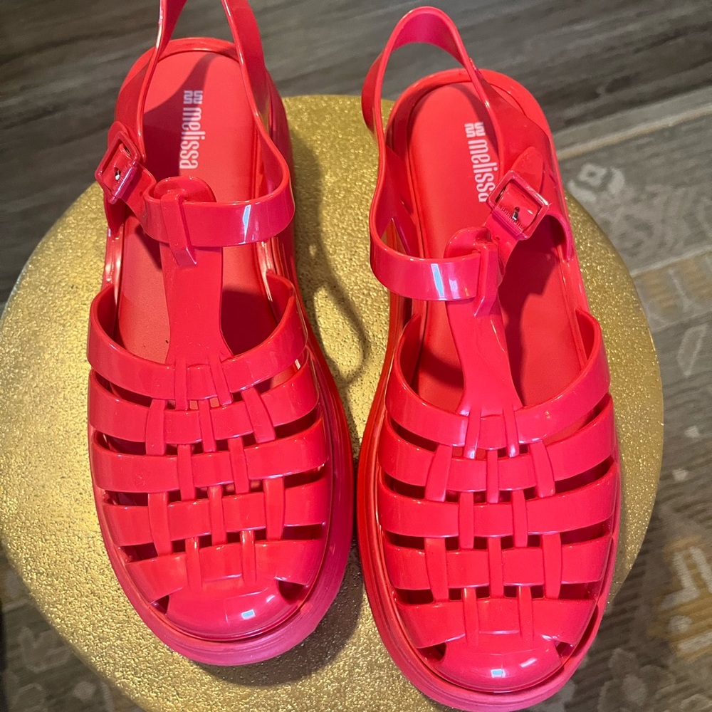 Melissa brand 
Ladies size 9 
Red jelly Sandals